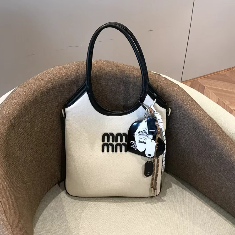 Mijiamei米茄美高级小众拼色腋下托特包MJM070